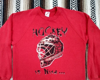 80s Hockey Sweatshirt vintage Sportswear NHL Playoffs phrase quote Hockey is Nice... til you Hit the ICE red Raglan 50/50 1980s Goalie Mask