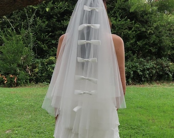 Velo de novia estilo vintage con lazo y cintas de satén