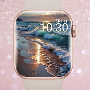 Könnte beinhalten: Eine roségoldene Smartwatch mit cremefarbenem Armband zeigt eine Strandszene mit Wellen und Sonnenuntergang. Die Uhrzeit ist 10:30 Uhr am Freitag. Der Text "Luxe Babe" befindet sich in der oberen linken Ecke.