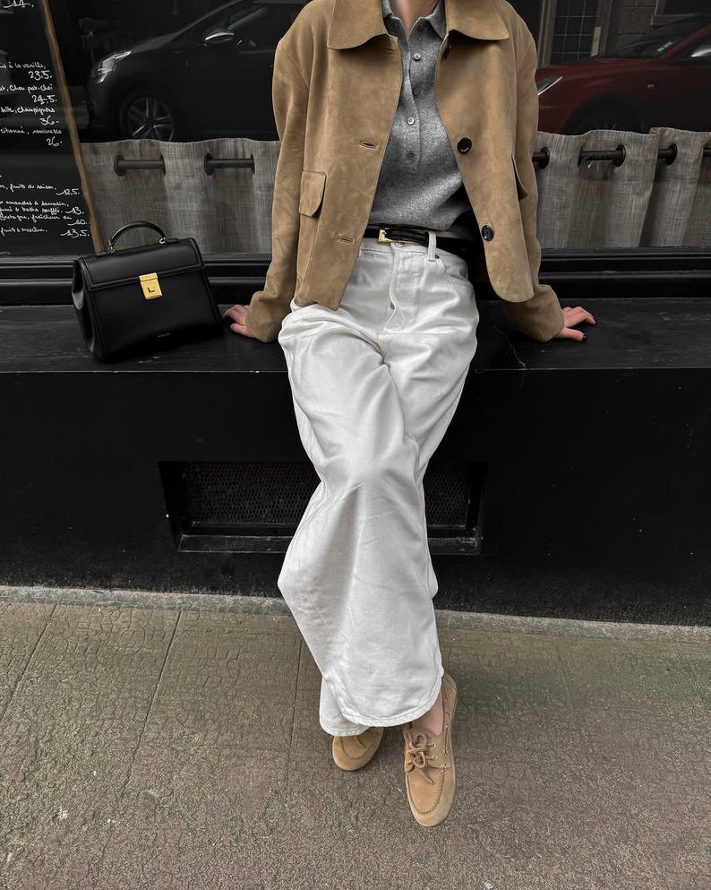 Minimalist outfit featuring beige leather jacket for women with relaxed tailored silhouette
