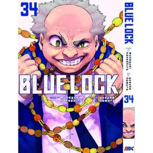 May include: A manga volume titled "BLUE LOCK" with the number 34 prominently displayed. The cover features a detailed illustration of a stern-faced character with a wide grin, wearing a blue suit and a beaded necklace.