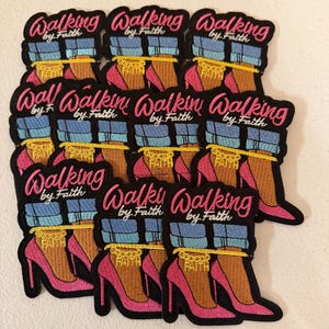 May include: A collection of embroidered patches featuring a graphic of legs in blue cuffed jeans and pink high-heeled shoes. Each patch includes a gold-colored chain anklet with the word FAITH and the text Walking by Faith in pink script.