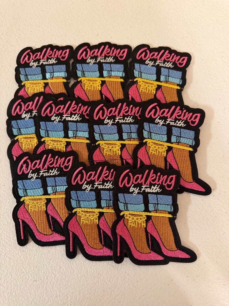 May include: A collection of embroidered patches featuring a graphic of legs in blue cuffed jeans and pink high-heeled shoes. Each patch includes a gold-colored chain anklet with the word FAITH and the text Walking by Faith in pink script.