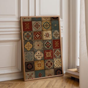 May include: A rectangular framed wall art piece featuring a grid of square tiles with intricate patterns in shades of red, blue, yellow, and cream. The design displays a variety of symmetrical floral and geometric motifs across the surface.
