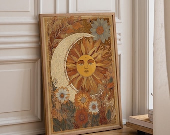May include: A rectangular framed wall art print featuring a central sun with a human face surrounded by a crescent moon and various floral elements in shades of orange, yellow, brown, and muted green, all set against a textured golden background.