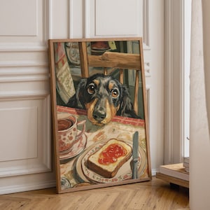 May include: Framed art print featuring a dachshund dog at a table. The dog is peering over a chair at a plate of toast with jam and a cup of tea. The artwork has a vintage, illustrative style.