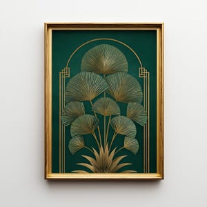 May include: A framed art print featuring a gold and green Art Deco design. The artwork showcases stylized fan-shaped leaves in gold against a deep green background. The gold frame complements the artwork's elegant aesthetic.