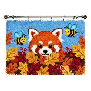 May include: A rectangular punch needle wall hanging featuring a red panda face peeking out from a pile of autumn leaves in shades of orange, yellow, and brown. Two cartoon bees fly in a light blue sky above, with small red berries scattered throughout.