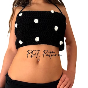 May include: Black crochet crop top with white polka dots. The top has a square neckline and thin straps. The text "PDF Pattern" is written in cursive across the image.
