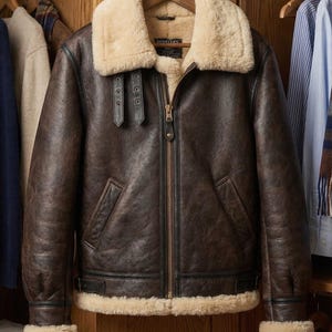 Chaquetas de cuero con forro de borrego inspiradas en Resident Evil de Leon S. Kennedy, abrigos de motociclista marrones.