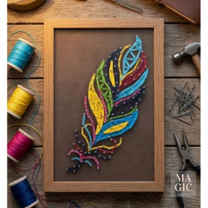 May include: A framed string art piece featuring a multi-colored feather design created with vibrant threads in shades of yellow, green, blue, and magenta, secured by small metal nails on a dark brown background within a light wood frame.