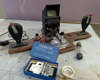 VINTAGE  Craig Projecto Editor & Revere CURV-A-MATIC 8mm, 16mm + Franklin boxed film splicer with bottles and wood base