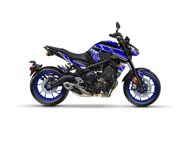 May include: A blue and black Yamaha MT-09 motorcycle with a white background. The motorcycle has blue wheels, a black frame, and blue and white graphics. The motorcycle is a sport bike.