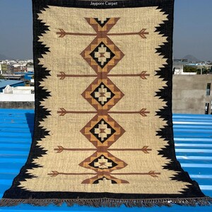 wool jute rug

kilim rug

tribal area rug

boho rug

geometric rug

handwoven rug

neutral area rug

beige black rug

flatweave rug

rustic home decor

farmhouse rug

living room rug

bohemian decor