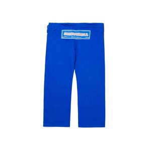 May include: Bright blue martial arts pants with a rectangular patch on the back. The patch has the text "SHOW YOUR ROLL" in white and blue lettering. The pants are made of a durable material.