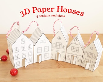Może przedstawiać: Rząd pięciu białych domków z papieru 3D z czarnymi konturami, każdy o unikalnym projekcie architektonicznym. Domki połączone są czerwoną i białą nitką. Tekst "3D Paper Houses" i "5 designs and sizes" jest wyświetlany na czerwono.