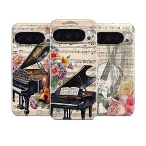 Puede incluir: Fundas para teléfono con temas musicales. Las fundas presentan un piano de cola, un violín y partituras con detalles florales. Las fundas tienen una estética vintage con un fondo crema y el texto "Rose From You".