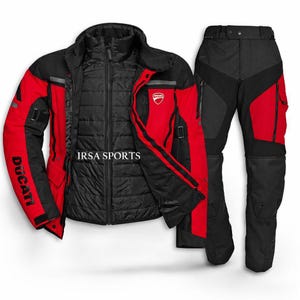 May include: A black and red motorcycle jacket and trousers set. The jacket features the word "Ducati" on the sleeve and a Ducati logo on the chest. The trousers are black with red detailing.