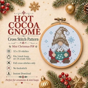 May include: A cross stitch pattern titled HOT COCOA GNOME featuring a gnome holding a mug, displayed in a 3-inch wooden hoop. The text specifies 32 x 35 stitches, 14-count Aida, full cross stitches only, no backstitch, and instant download.