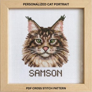 May include: Cross-stitch portrait of a cat named Samson, framed in light wood. The cat has brown and tan fur, green eyes, and a pink nose. The text "PERSONALIZED CAT PORTRAIT" and "PDF CROSS STITCH PATTERN" are at the top and bottom.