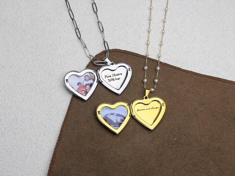 May include: Three heart-shaped lockets. Two are silver, one with a photo and the other with the inscription "From Momma With love." The third locket is gold, with a photo and the inscription "forever and always." One gold and two silver chains.