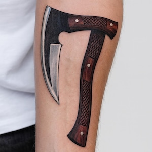 May include: A white ceramic mug with a black handle and the text "But First, Coffee" in a black, bold font. The mug is sitting on a white surface. The mug is approximately 4 inches tall.