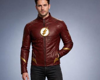 May include: A dark red leather jacket featuring a high collar, a full-length front zipper, and gold-colored lightning bolt accents on the chest and sleeves. The chest displays a circular emblem with a yellow lightning bolt symbol.