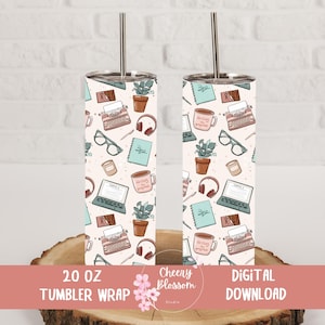 May include: Two 20 oz tumbler wraps with a repeating pattern of writing-themed illustrations. The design includes typewriters, laptops, coffee mugs, eyeglasses, and notebooks on a cream background. Each tumbler has a silver lid and straw.