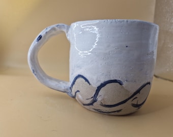 White and blue seascape ceramic mug