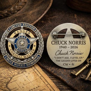 May include: A limited edition commemorative coin featuring a star-shaped badge with the text "Texas Ranger Cordell Walker Memorial" and the name "Chuck Norris." The coin is gold and blue with a silver border. The reverse side has the text "Chuck Norris 1940-2026."