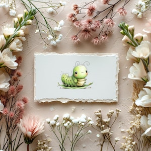 May include: A watercolor illustration of a cute green caterpillar with a smiling face, sitting on a leaf. The artwork is on a textured, off-white paper, surrounded by white and pink flowers on a light beige background.