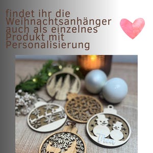 May include: Wooden Christmas ornaments with various designs, including snowflakes, trees, and snowmen. The ornaments are laser-cut and have a natural wood finish. The image also includes text in German: "IN UNSEREM SHOP".