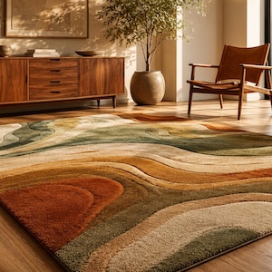May include: A rectangular area rug featuring a textured, multi-layered design with flowing, organic wave patterns in shades of burnt orange, deep brown, sage green, and cream, creating a dimensional look across the entire surface of the rug.