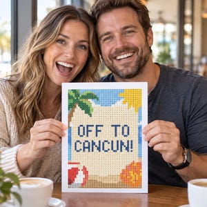 May include: A rectangular diamond painting craft project featuring a beach scene with a palm tree, a yellow sun, and a red and white beach ball. The center of the artwork displays the text OFF TO CANCUN! in dark blue letters against a light background.