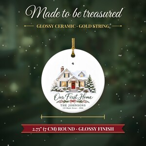 May include: A round white glossy ceramic ornament featuring a house illustration, the text "Our First Home", "THE JOHNSONS", and "123 Maple Street - 2026". It includes a gold string and measures 2.75 inches in diameter.