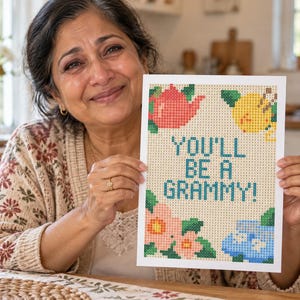May include: A rectangular diamond painting craft project featuring a beige background with the text YOU'LL BE A GRAMMY! in teal. The design includes a red teapot, a yellow lemon, pink flowers, and blue flowers, all rendered in a pixelated grid style.