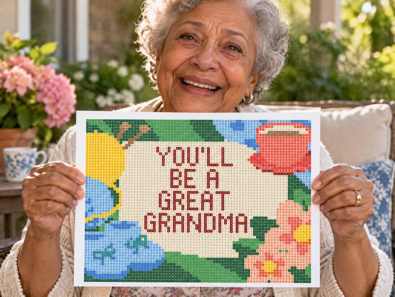 May include: A rectangular diamond painting craft featuring the text YOU'LL BE A GREAT GRANDMA in dark red letters. The design includes a yellow ball of yarn with knitting needles, blue baby booties, a red teacup, and pink flowers on a light background.