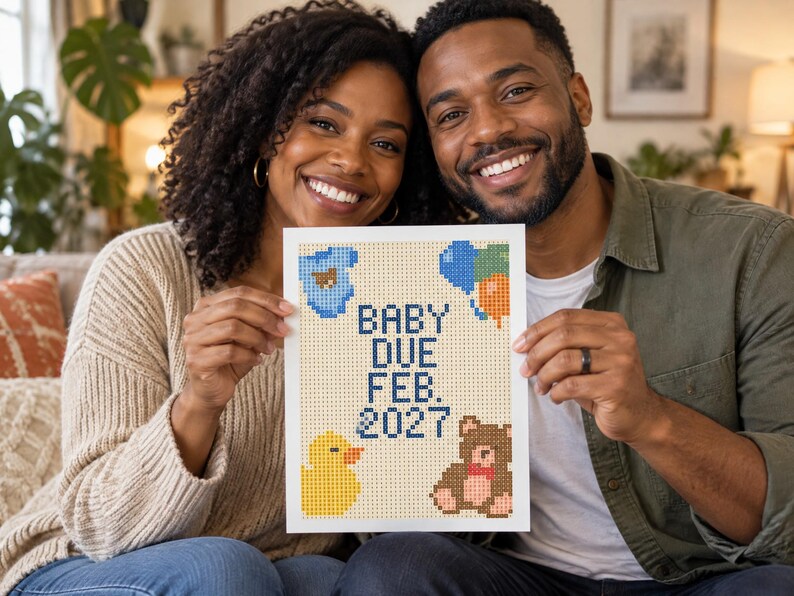 May include: A rectangular sign featuring a pixelated design with the text BABY DUE FEB. 2027 in dark blue. The design includes a blue baby onesie, a cluster of blue, green, and orange balloons, a yellow rubber duck, and a brown teddy bear.