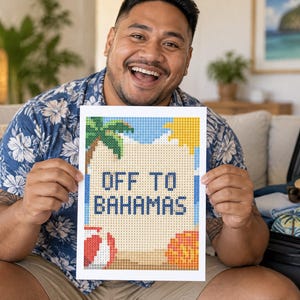 May include: A rectangular diamond painting craft project featuring a pixelated beach scene with a palm tree, a yellow sun, a red and white beach ball, and an orange seashell. The text OFF TO BAHAMAS is printed in dark blue block letters in the center.