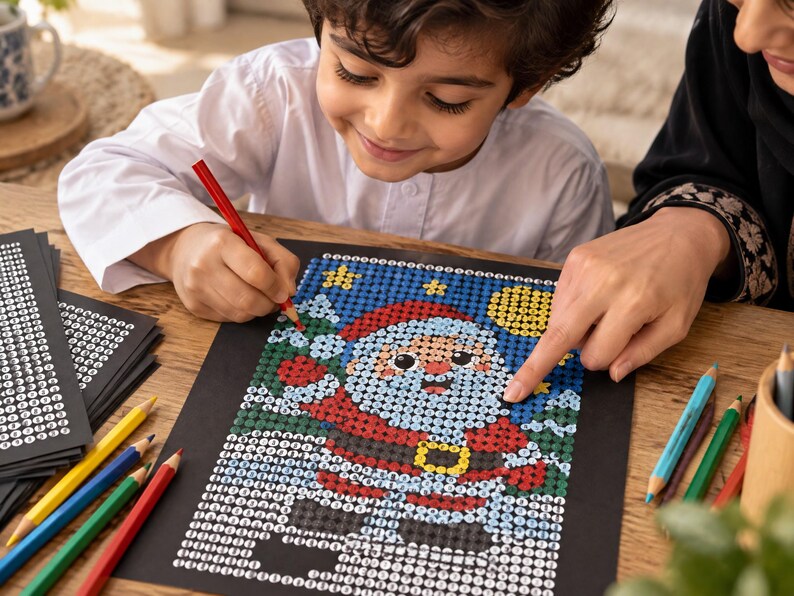 May include: A diamond painting kit featuring a colorful Santa Claus design on a black adhesive sheet. The image shows a partially completed mosaic of Santa with a red hat, white beard, and yellow belt buckle, surrounded by scattered colored pencils.