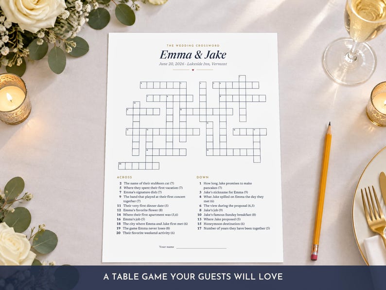 May include: A white rectangular wedding crossword puzzle game sheet titled Emma & Jake, dated June 20, 2026, at Lakeside Inn, Vermont. The paper features a grid of empty boxes for answers, with numbered clues listed below for across and down categories.