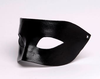 Venetian mask. Black mask. Leather mask