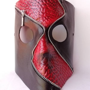 Leather bauble. Leather mask. Venetian mask