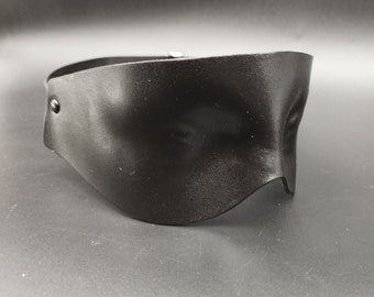 Black leather blindfold.