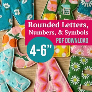 May include: A collection of fabric letters featuring various colorful patterns including flowers, oranges, and milk cartons. The text overlay reads Rounded Letters, Numbers, & Symbols PDF DOWNLOAD 4-6 inches, indicating the size of these craft items.