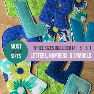 May include: Fabric letters in various shades of blue and green with floral, polka dot, and swirl patterns. Text on the image states: MOST POPULAR SIZES THREE SIZES INCLUDED (4", 5", 6") LETTERS, NUMBERS, & SYMBOLS. The letters are stitched around the edges.