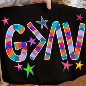 May include: A white ceramic mug with a black handle and the text "But First, Coffee" in a bold, black font. The mug is set against a neutral background, highlighting its simple design.