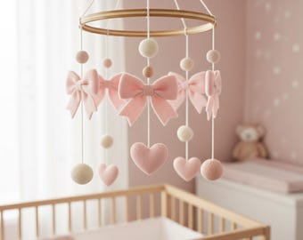 Móvil de fieltro hecho a mano con lazo, lazo rosa pastel crema, decoración minimalista para niñas.