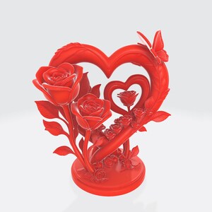 May include: A red decorative sculpture featuring a heart-shaped design with roses and a butterfly. The sculpture has a round base and includes two large roses, smaller roses, and a butterfly on the heart.