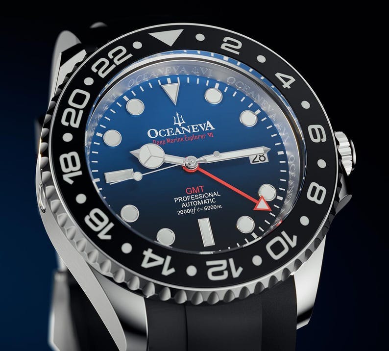 K&ouml;nnte beinhalten: Eine Oceaneva Deep Marine Explorer VI-Uhr aus Edelstahl mit schwarzer L&uuml;nette und blauem Zifferblatt. Die Uhr verf&uuml;gt &uuml;ber wei&szlig;e Stundenmarkierungen, ein Datumsfenster und einen roten Sekundenzeiger. Sie hat ein schwarzes Kautschukarmband. Der Text auf dem Zifferblatt lautet "GMT PROFESSIONAL AUTOMATIC 20000ft = 6000m".